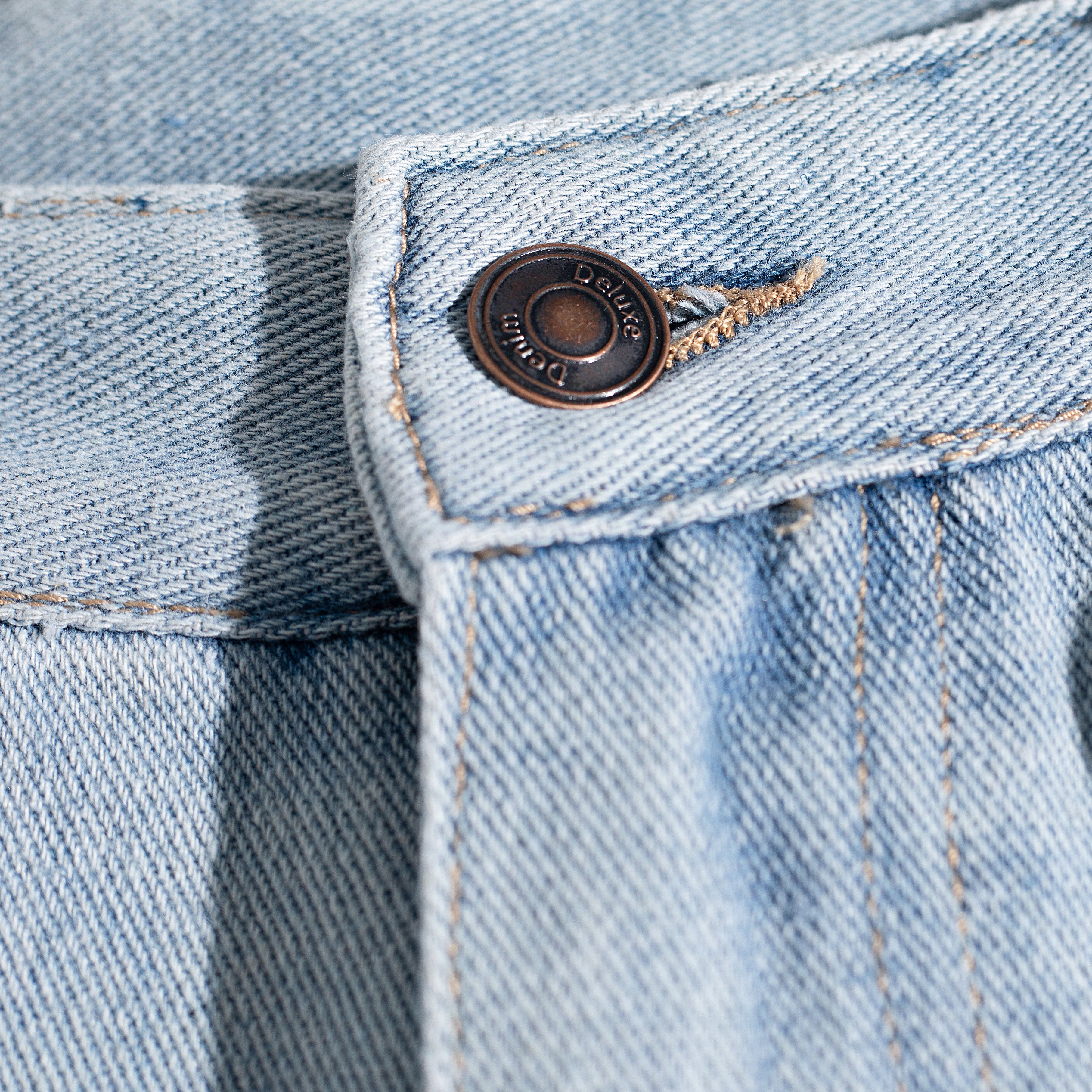 Light Wash Ripped Curved Leg Jeans