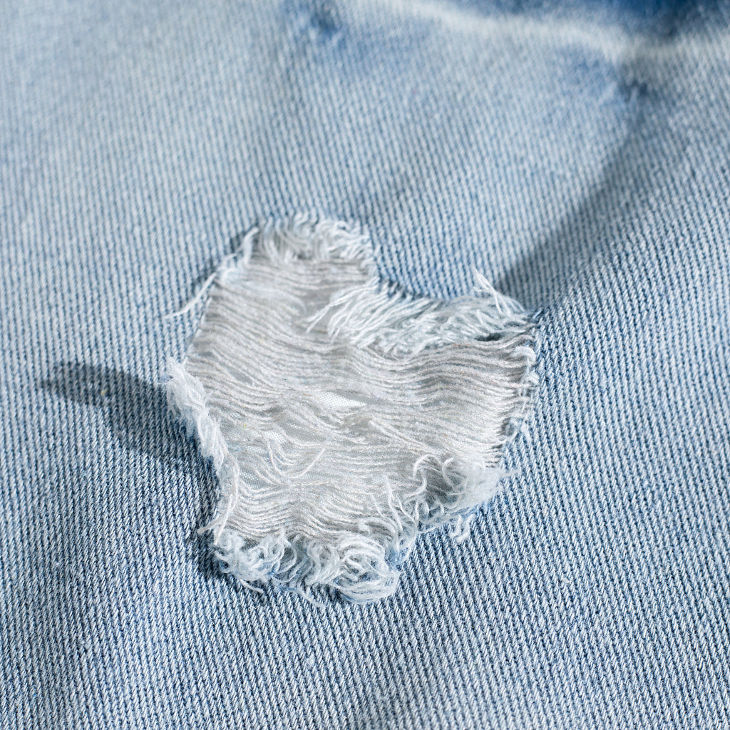 Light Wash Brush Mark Ripped Curved Jeans