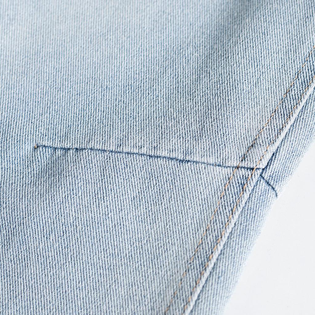 Light Wash Brush Mark Ripped Curved Jeans