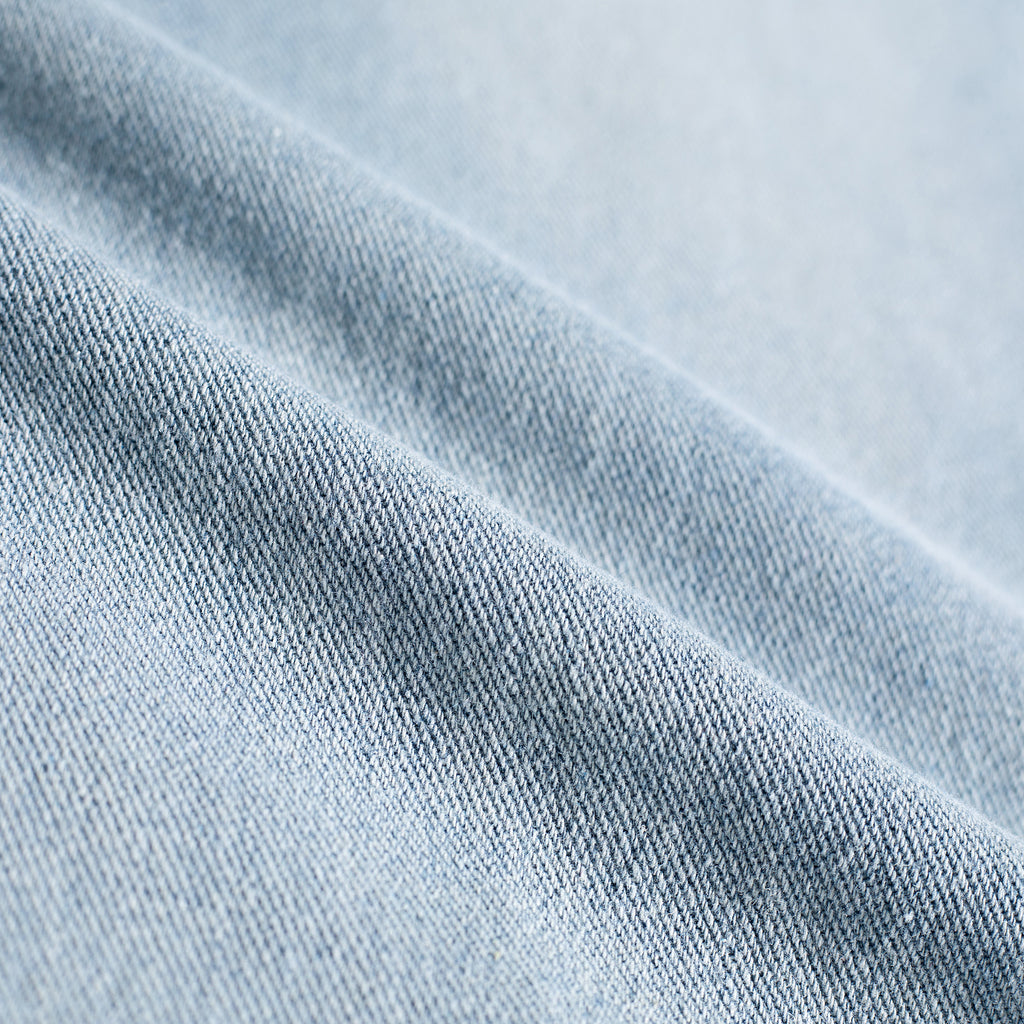 Light Wash Brush Mark Ripped Curved Jeans