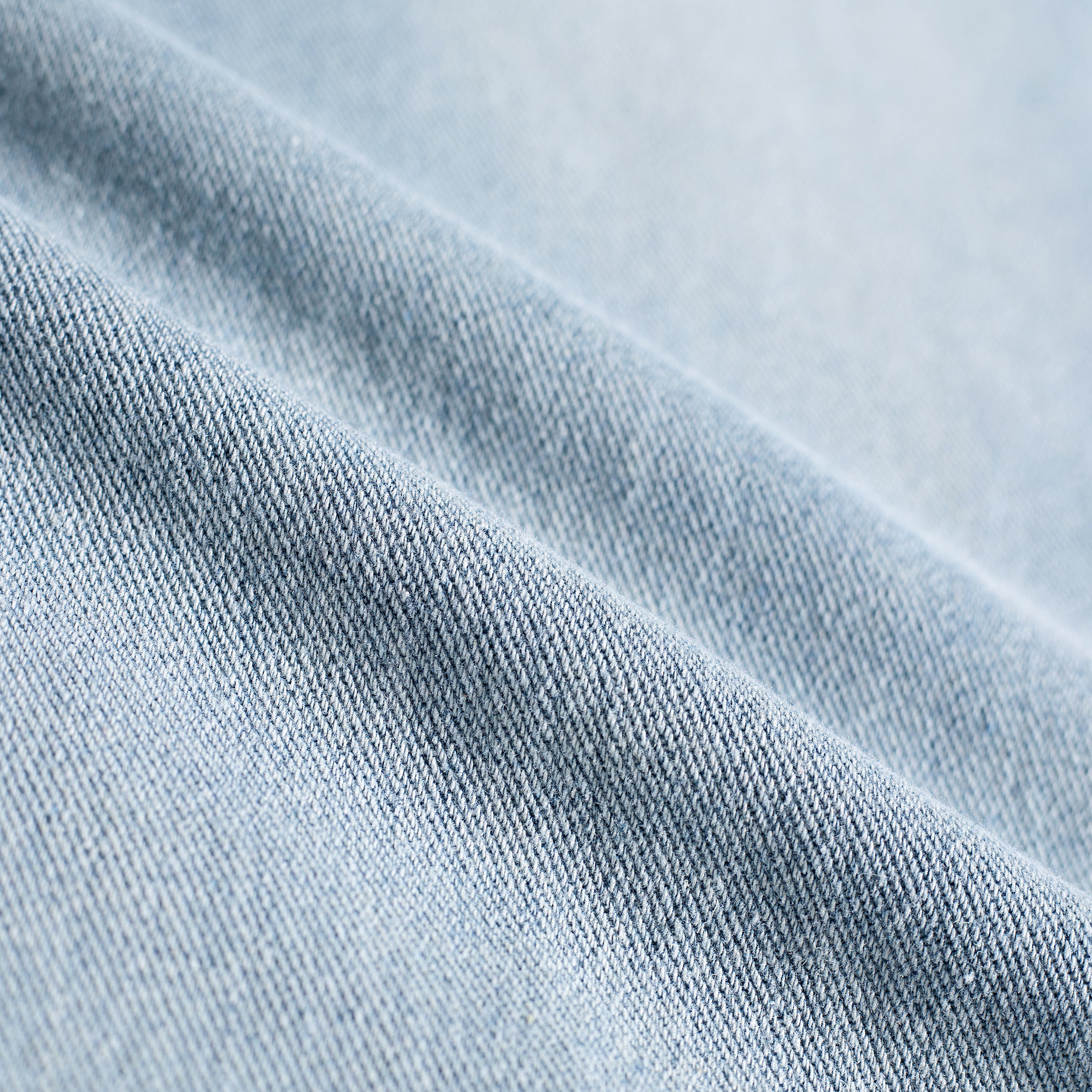 Light Wash Brush Mark Ripped Curved Jeans