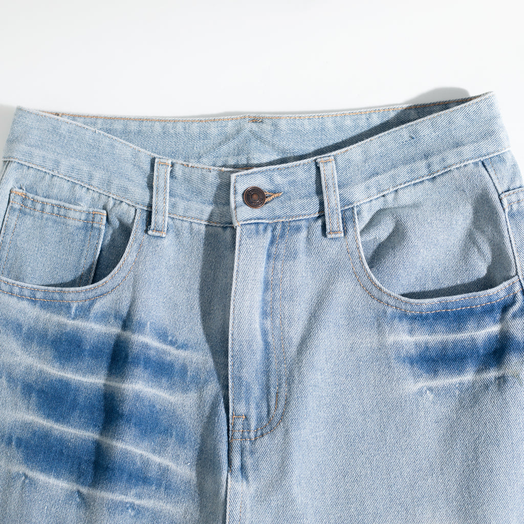 Dual-Side Brush Mark Curved Baggy Jeans