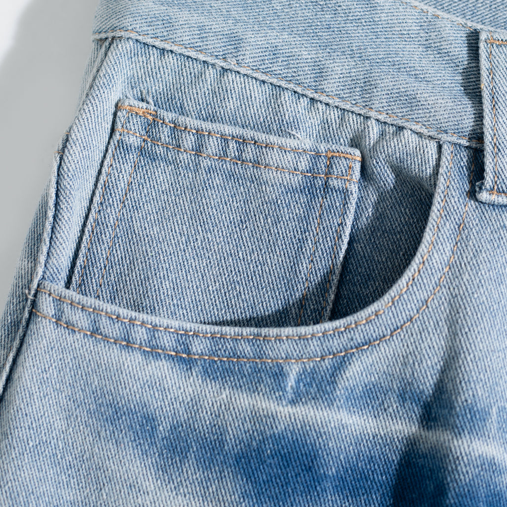 Dual-Side Brush Mark Curved Baggy Jeans