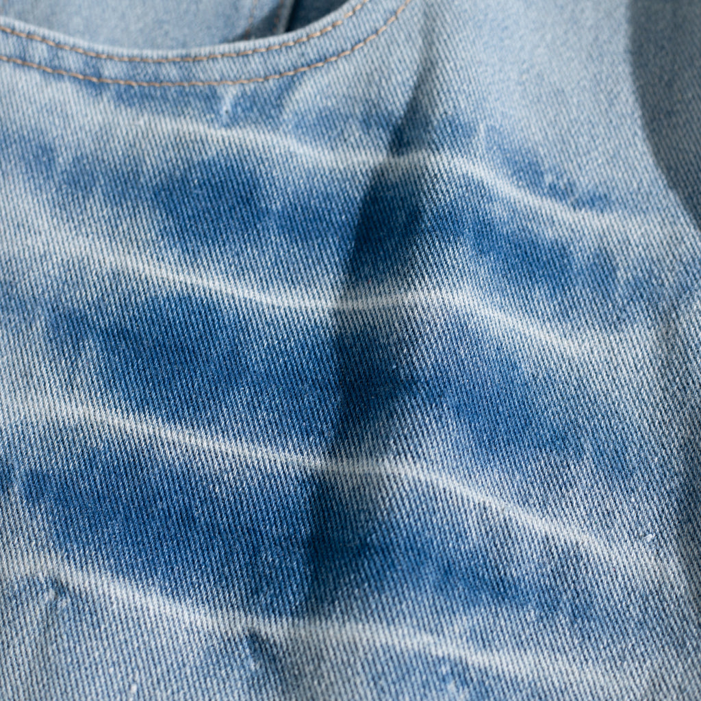Dual-Side Brush Mark Curved Baggy Jeans