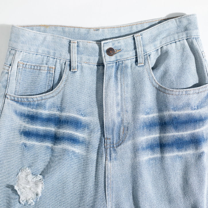 Light Wash Brush Mark Ripped Curved Jeans