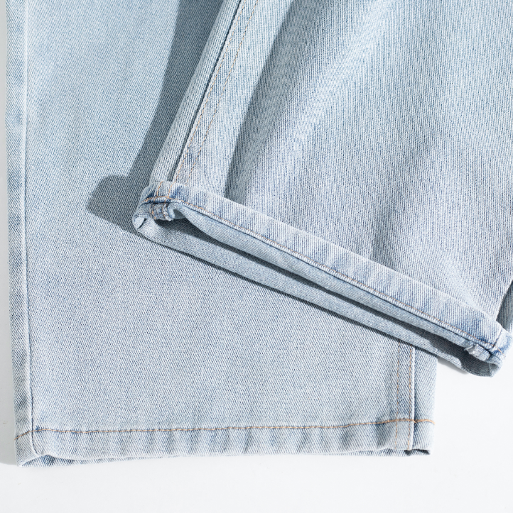 Light Wash Brush Mark Ripped Curved Jeans